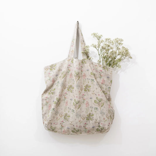 Tygpåse med blommor och blad 